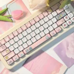 Strange Beast MOA PBT Keycaps set. Multiple views display whimsical monster art and the ergonomic MOA profile, perfect for playful, comfortable keyboard.