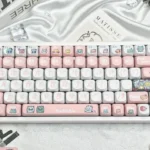 A full set of playful Strange Beast MOA PBT keycaps featuring whimsical monster art, showcasing their ergonomic MOA profile for comfortable typing.