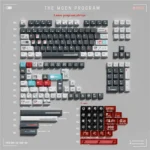 A collection of Moon Project Keycaps, showcasing the durable dye-sub PBT+PC set from various angles, highlighting the immersive cosmic lunar landscape.