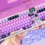 A vibrant Moria Luluka side-lit PBT keycaps set, featuring playful anime character art and translucent legends, shown from various angles, perfect for fans.
