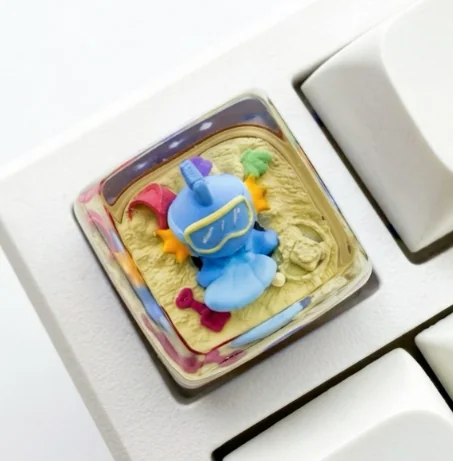 Vibrant, handcrafted translucent SA Mudkip keycap, a unique resin art piece beautifully capturing the beloved Pokemon character.