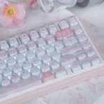 Cute My Melody crystal jelly full keycap set, showcasing adorable characters and a translucent KDA Profile design from various angles.