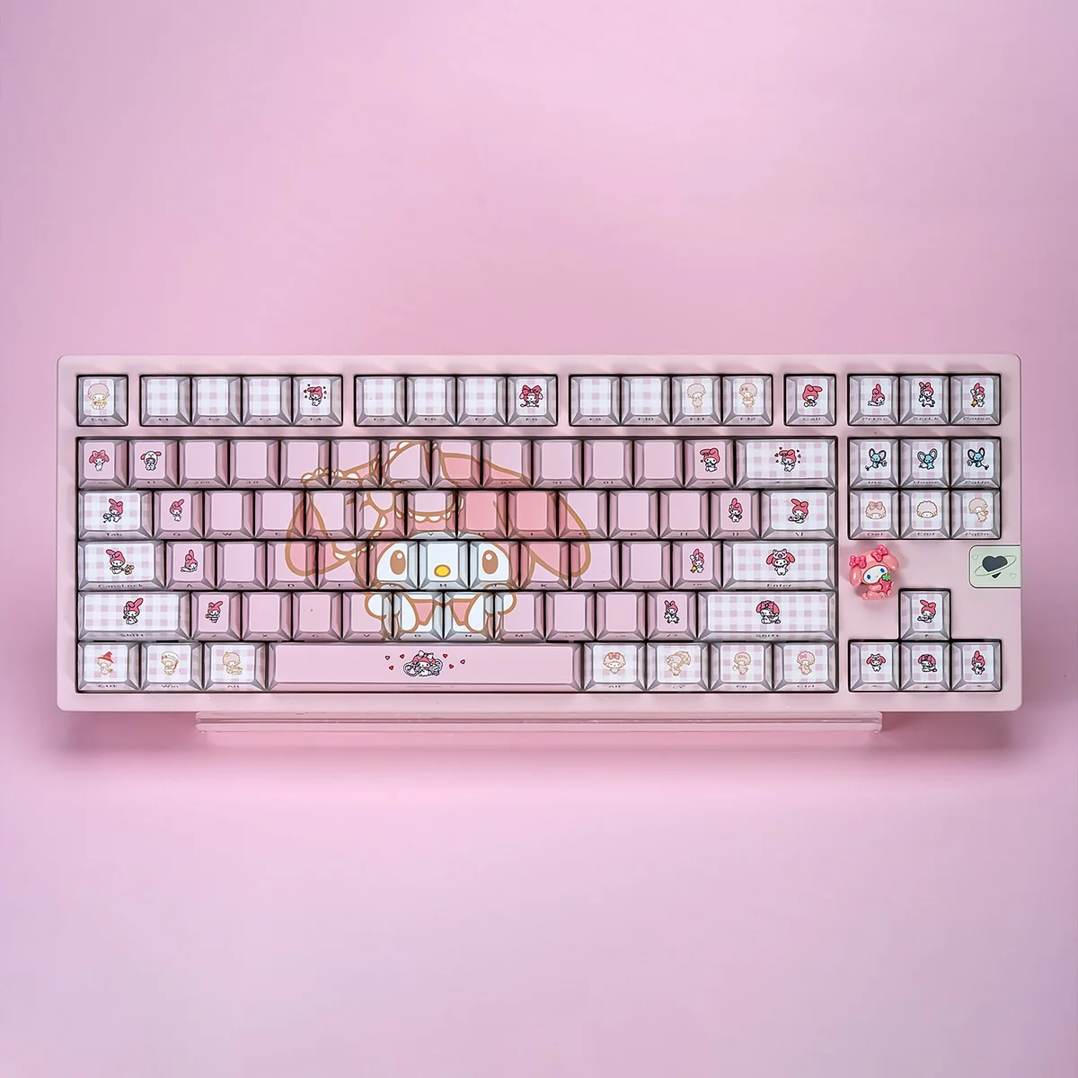 Angled view of the My Melody Geometric PBT Keycaps Set, highlighting unique pastel geometric designs. Whimsical My Melody artistry on durable PBT.