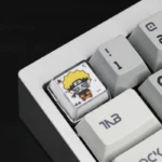 Naruto Chewing Resin Keycaps, a handcrafted artisan set. Vibrant anime characters in playful poses, showcasing lustrous resin from unique angles.