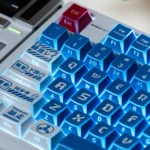Exclusive NGE Lilith Dye-Sub PBT keycap set, showcasing its ethereal hues and striking geometric design from a unique artistic angle.
