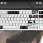 NieR Automata Keycaps Set: Iconic YoRHa 2B Dye-Sub PBT set displayed, capturing the dystopian sci-fi aesthetic with monochrome precision.