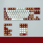 Notre-Dame PBT Keycaps Set, displaying their pearlescent metallic finish and intricate Gothic architectural details from multiple elegant angles.