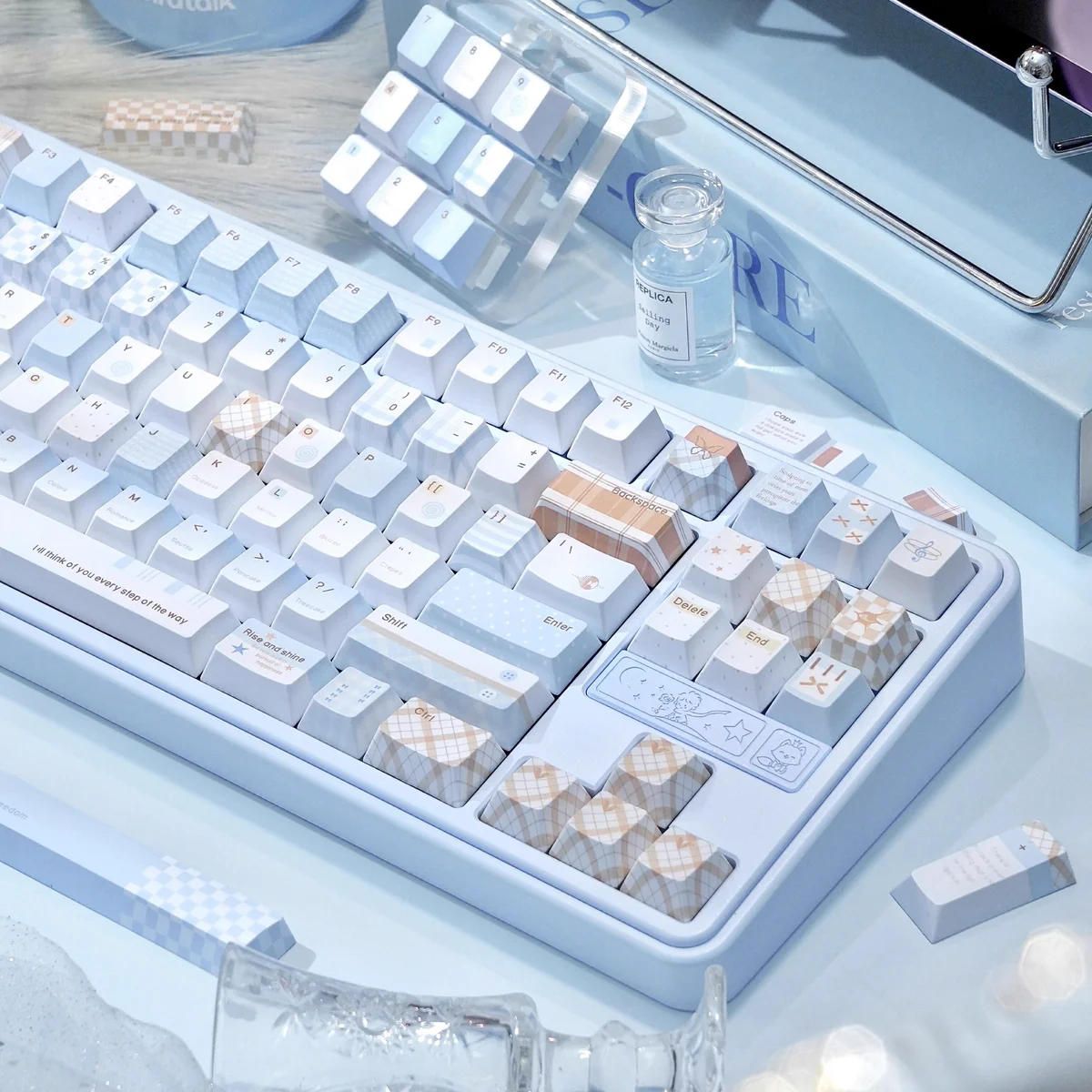 Premium Cocoa Blue PBT dye-sub keycap set, showcasing its unique warm cocoa and serene blue hues. Enhance desktop aesthetics with these stylish.