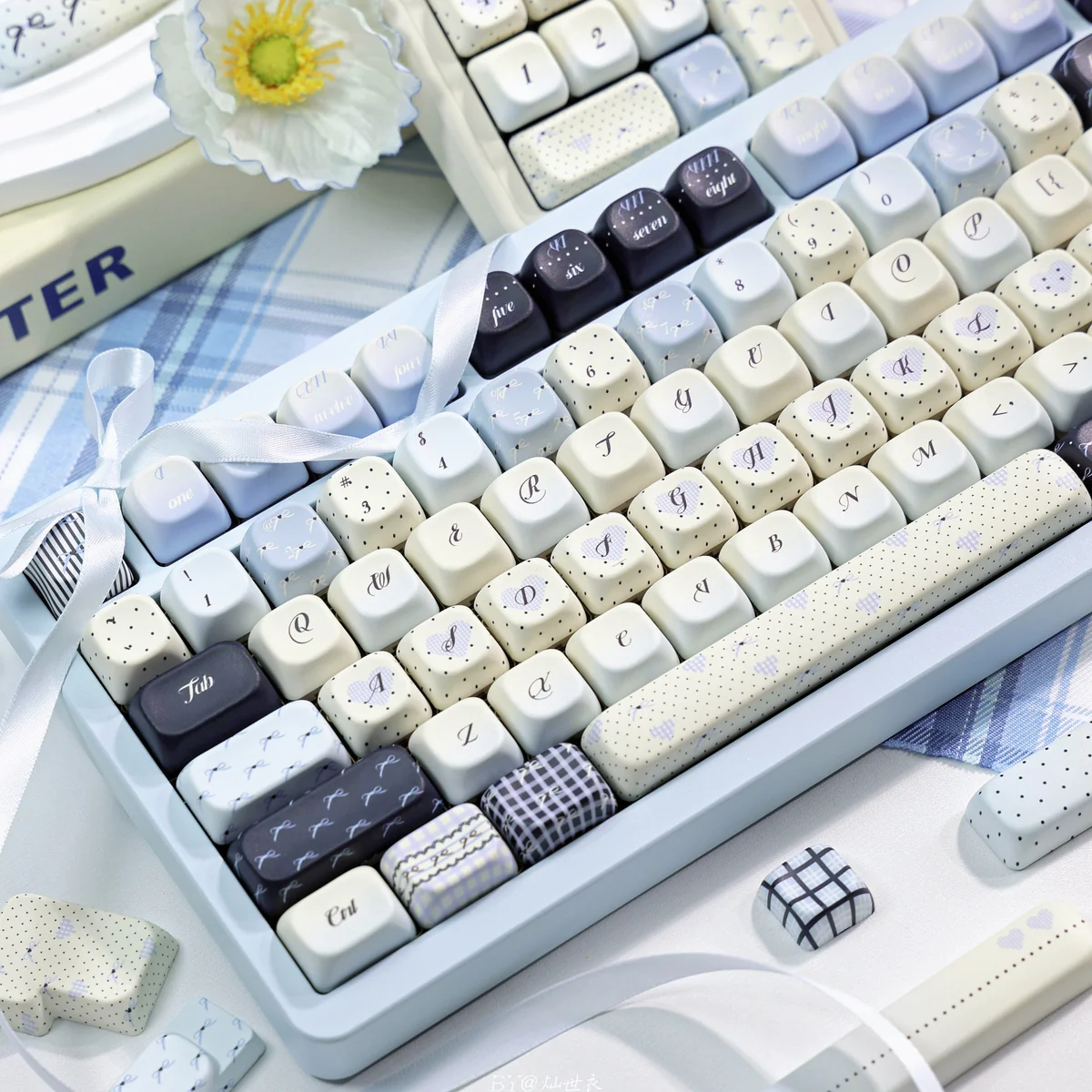 Multiple angles of PBT Sea Salt Keycaps Set, revealing their durable dye-sub PBT and tranquil speckled dot pattern, embodying a minimalist ocean aesthetics.