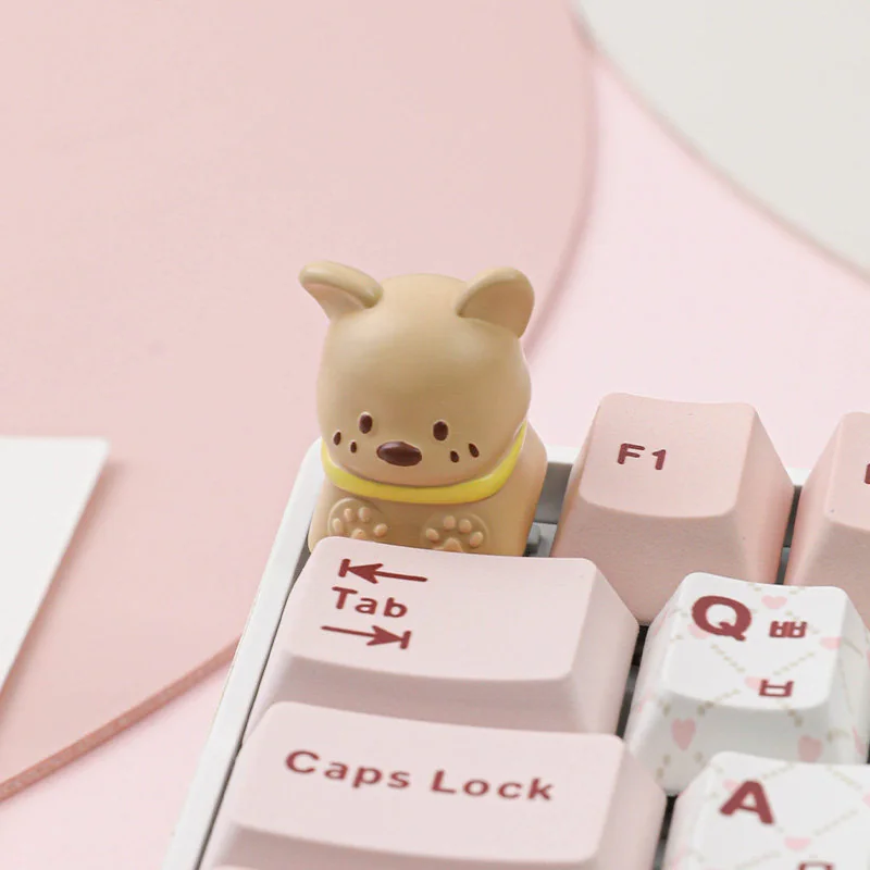 Whimsical handcrafted pet cafe keycaps, featuring adorable animal friends in cozy pastel settings, viewed from different angles to highlight details.
