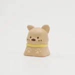 Detailed view of a charming pet cafe keycap, handcrafted with whimsical animal characters in a cozy pastel coffee shop setting.