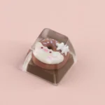 Adorable handcrafted piggy donut artisan ESC keycap shown from multiple playful angles, highlighting its sweet, colorful, dessert-inspired design.