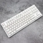 Whimsical Pink Bear PBT Keycaps set, featuring adorable white keycaps with charming pink bear designs, displayed from a unique angle.