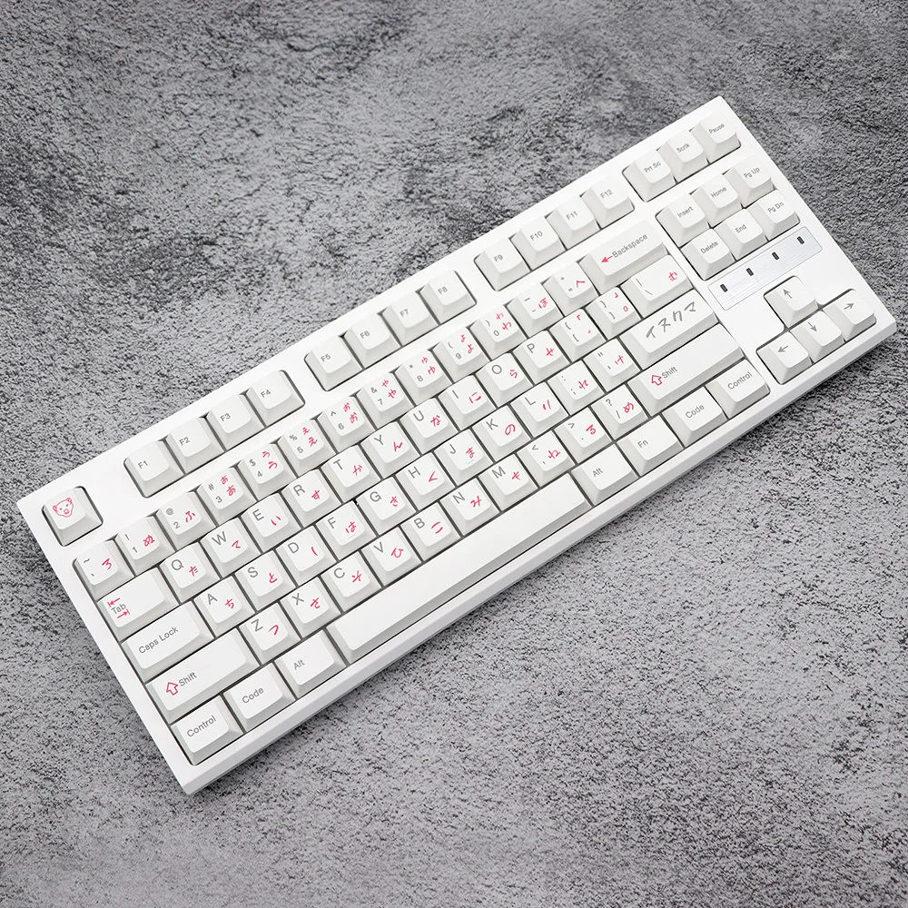 Whimsical Pink Bear PBT Keycaps set, featuring adorable white keycaps with charming pink bear designs, displayed from a unique angle.