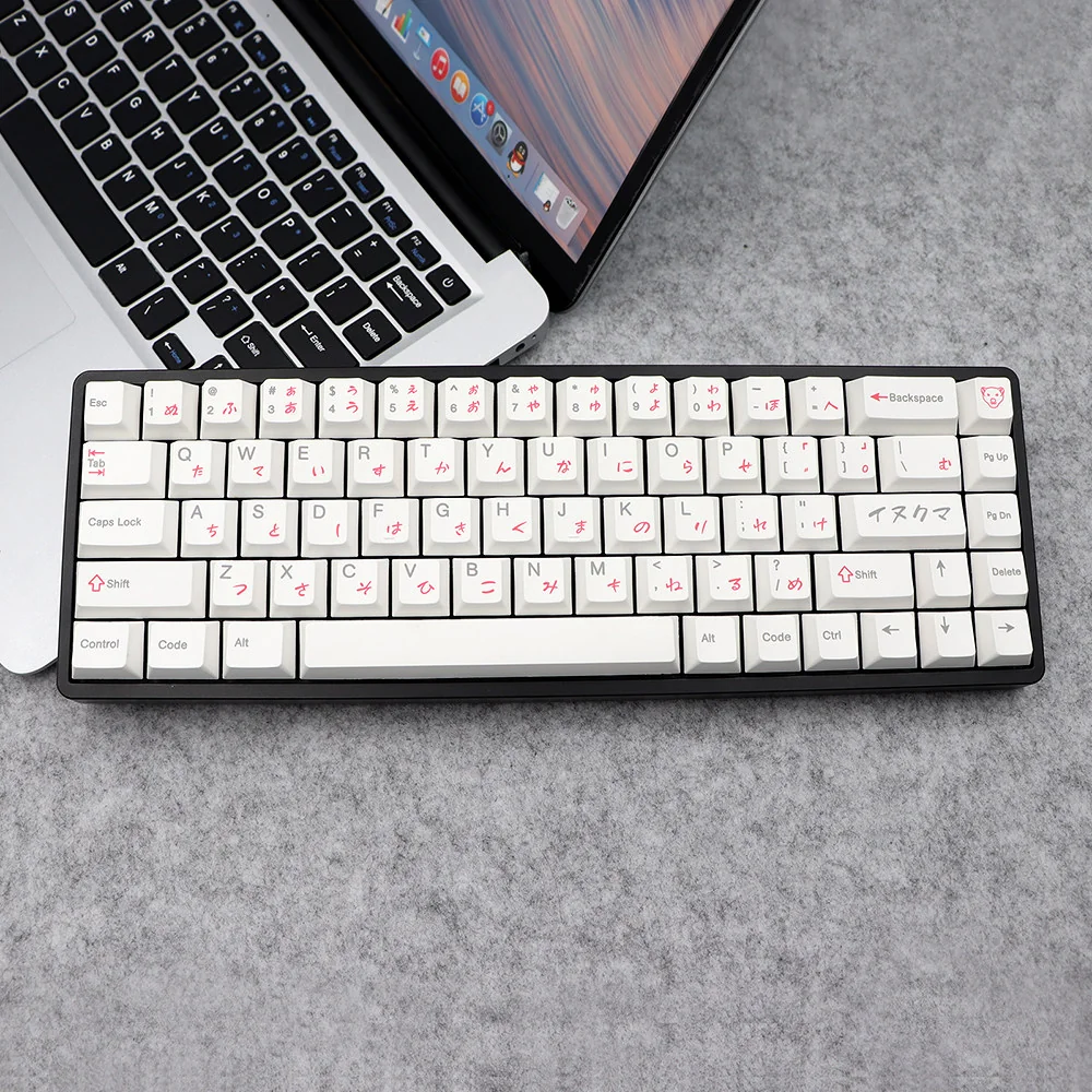 Adorable Pink Bear PBT Keycaps Set displayed, featuring whimsical white keycaps with charming pink bear designs and wide compatibility.