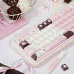 Pink Chocolate Series Keycap Set, showcasing the charming hues motifs from a playful angle, evoking a delightful dessert aesthetics.