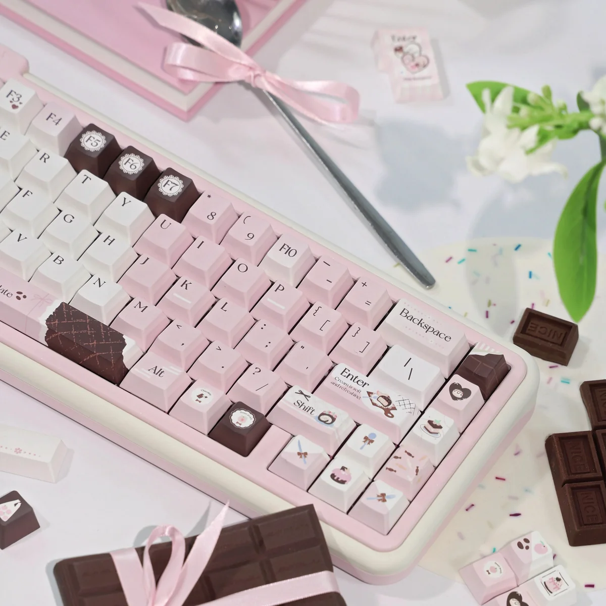 A Pink Chocolate Series Keycap Set, featuring charming hues keys with heart motifs, evoking playful dessert nostalgia.