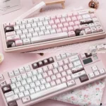 Pink Chocolate Series Keycap Set featuring charming hues keycaps with playful heart motifs, evoking sweet nostalgia.