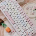 Close-up of Dreamy Pink Star Keycaps showcasing the celestial design with delicate stars, enhancing a personalized keyboard aesthetic.