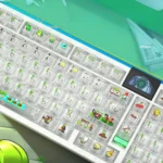 A vibrant set of iconic Plants vs. Zombies transparent PC keycaps set, showcasing clear characters glowing playfully from various angles on a desk.