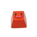 Detailed orange handcrafted resin Charmander Pokemon artisan keycap, bringing a vibrant, playful touch to your keyboard.
