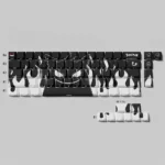 Vibrant purple Gengar PBT keycaps set, multiple views. Side-printed legends and translucent backlit design capture playful Pokemon charm.