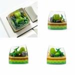 Vibrant, translucent artisan Treecko Pokemon SA resin keycap, handcrafted for RGB mechanical keyboards, displayed from a detailed, captivating angle.