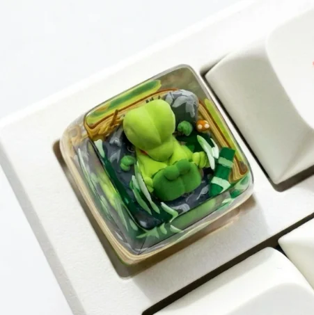 Vibrant, handcrafted SA profile Treecko Pokemon keycap made of translucent resin, perfect for artisan RGB mechanical keyboards.
