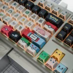 Artistic shot of Pokemon PBT keycaps set, emphasizing the vibrant backlit effect and geometric character designs with clear side-printed legends.