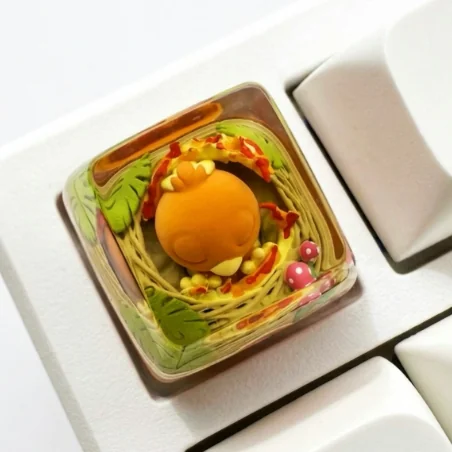 Vibrant handcrafted Pokemon Torchic artisan keycap, made from translucent resin with a classic SA profile, showcasing its backlit detail.