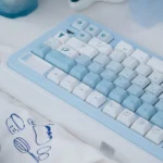 Close-up of the durable PBT dye-sublimated Arctic Bear keycap set, revealing the serene gradient blue and white artistic design reminiscent.