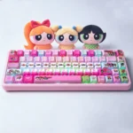 This playful Powerpuff Girls PBT Dye-Sub keycap set gallery shows Blossom, Bubbles, and Buttercup from multiple vibrant angles, ready for heroic fun.