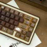 Unique Programmer Coffee PBT Dye-Sub Keycap Set from multiple angles, showcasing artistic coffee shop and abstract coding motifs for a cozy.
