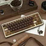 Unique Programmer Coffee PBT Dye-Sub Keycap Set, showcasing cozy coffee shop aesthetics and coding motifs for a warm dev desk.