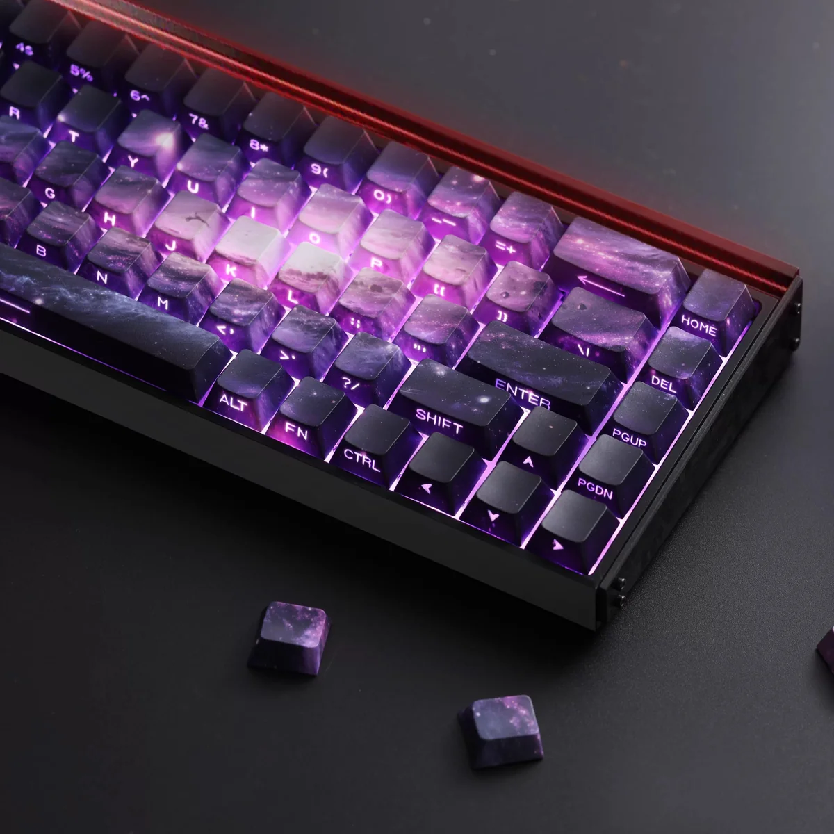 Mesmerizing Purple Galaxy PBT side-printed keycaps set from multiple perspectives, revealing their deep cosmic and subtle legends. Elevate your keyboard.