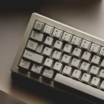 Retro Sun Cherry Keycap Set, showcasing its classic legends and warm vintage aesthetic from a distinct angle, ideal for nostalgic builds.