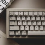 Retro Sun Cherry Keycap Set, artfully presented from various angles. Its classic warm tones and premium finish evoke a nostalgic vintage design.