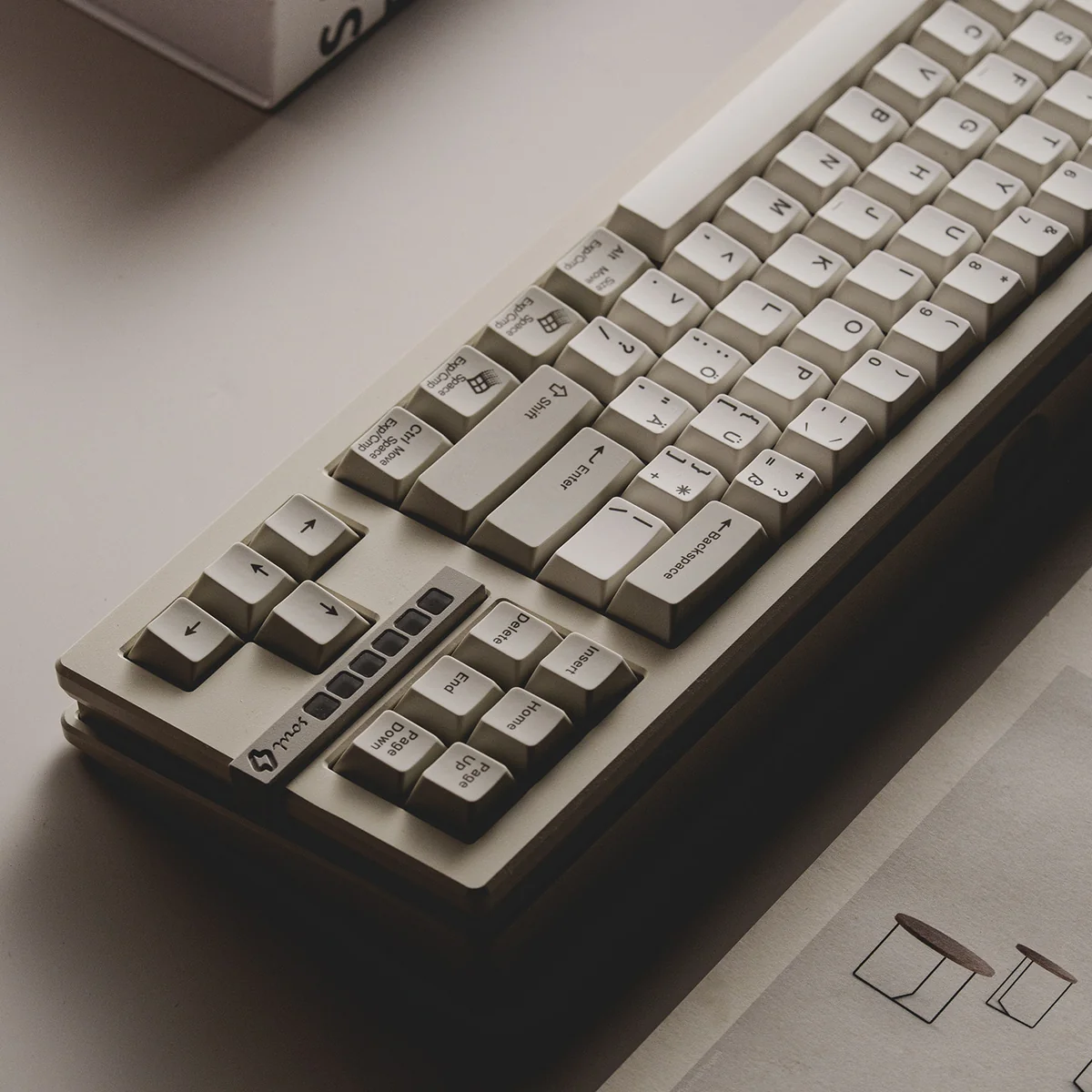 A detailed view of the premium Retro Sun Cherry Keycap Set, highlighting its classic warm tones and elegant vintage aesthetic from a distinctive view.