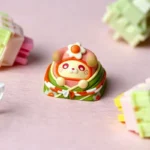 Close-up of a vibrant, handcrafted Rice Dumpling artisan resin ESC keycap, highlighting its intricate details and miniature dumpling design from an artistic design.