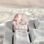 Whimsical Rocking Horse Angel Baby Artisan Keycap, featuring a serene angelic figure on a dreamlike rocking horse, evoking nostalgic childhood memories.