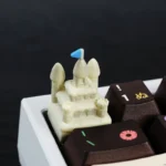 Captivating gallery view of the Sandcastle Artisan Keycaps, showcasing its intricate sculpted details and serene beach theme from various angle.