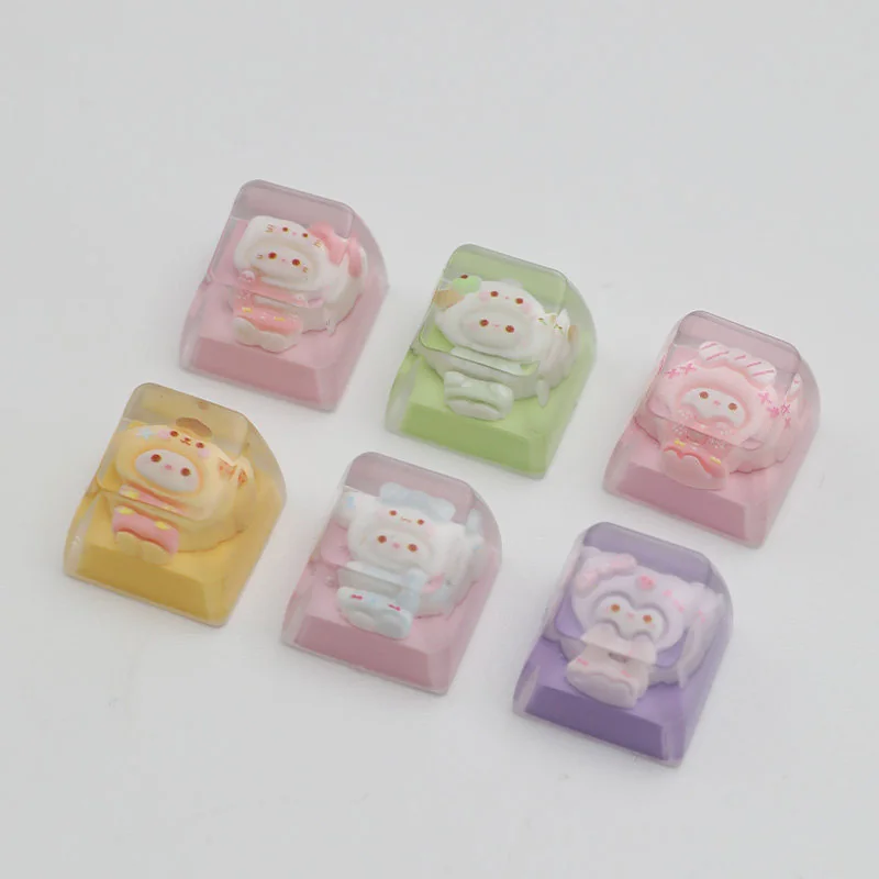 Adorable handcrafted Sanrio pajama ESC keycap, viewed from a new angle, featuring cozy characters in vibrant resin art, a charming custom keyboard accent.