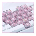 Multiple angles of adorable Sanrio translucent heart accent Supplement Keycap Set, glowing playfully with pastel colors. Features cute characters and transparent design.