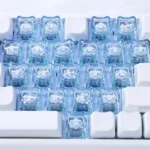 Adorable Sanrio translucent heart accent Supplement Keycap Set shown from various angles. Cute characters and pastel hearts glow vibrantly, highlighting their unique design.