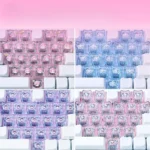 Adorable Sanrio translucent heart accent supplement keycaps set in MAO profile, featuring beloved characters and a vibrant, pastel backlight glow.