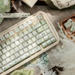 Exquisite Scarlett artisan keycap, showcasing vintage elegance and intricate details from various angles. Rich, captivating colors.