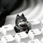 Detailed side view of the unique Scavenger Wolf artisan ESC keycap, a handcrafted resin masterpiece with an intricate, rustic post-apocalyptic wolf design.