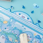 Close-up of the whimsical Shark Claw Machine Desk Mat, showcasing its extra-large comfort and playful design with adorable shark prizes in an arcade design.