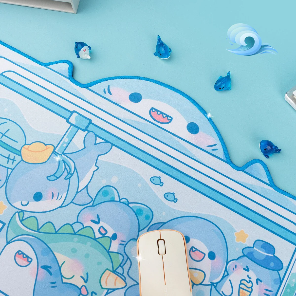 Close-up of the whimsical Shark Claw Machine Desk Mat, showcasing its extra-large comfort and playful design with adorable shark prizes in an arcade design.