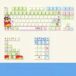 A collection of Shin-chan PBT side-lit keycaps set from various angles, showcasing vibrant Crayon Shin-chan characters subtly engraved for playful nostalgic design.